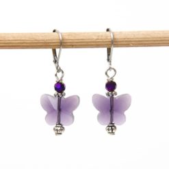 Edelstahl Ohrringe mit zauberhaften Schmetterlings Kristall violett