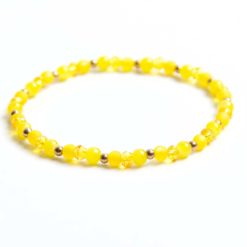Zartes Perlenarmband mit strahlend gelben Perlen – stabiles Gummiband Zartes Perlenarmband mit strahlend gelben Perlen - stabiles Gummiband