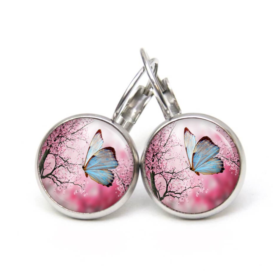 Ohrstecker, Ohrhänger, Clipse & Druckknopf – Motiv hellblauer Schmetterling – Schmuck aus Edelstahl Ohrstecker, Ohrhänger, Clipse & Druckknopf – Motiv hellblauer Schmetterling – Schmuck aus Edelstahl