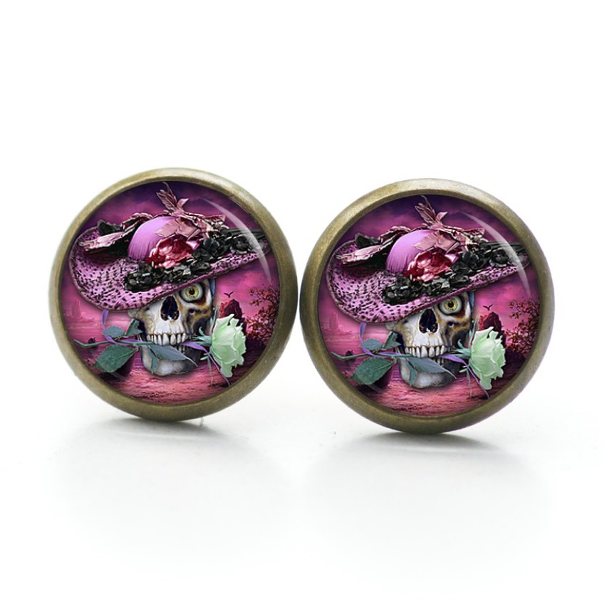 Ohrstecker, Ohrhänger, Clipse & Druckknopf – Motiv Totenkopf mit rosa Hut – Schmuck aus Edelstahl Ohrstecker, Ohrhänger, Clipse & Druckknopf – Motiv Totenkopf mit rosa Hut – Schmuck aus Edelstahl