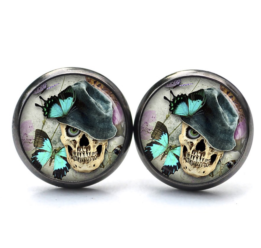 Ohrstecker, Ohrhänger, Clipse & Druckknopf – Motiv Totenkopf mit Schmetterlingen – Schmuck aus Edelstahl Ohrstecker, Ohrhänger, Clipse & Druckknopf – Motiv Totenkopf mit Schmetterlingen – Schmuck aus Edelstahl