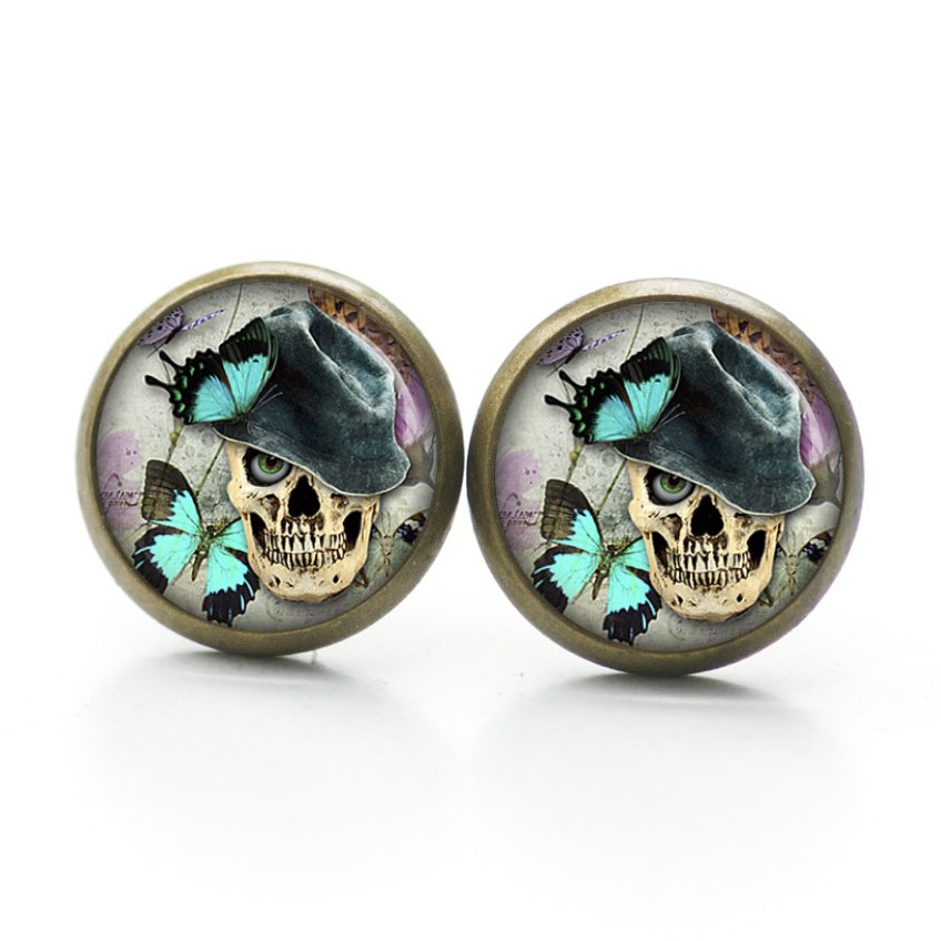 Ohrstecker, Ohrhänger, Clipse & Druckknopf – Motiv Totenkopf mit Schmetterlingen – Schmuck aus Edelstahl Ohrstecker, Ohrhänger, Clipse & Druckknopf – Motiv Totenkopf mit Schmetterlingen – Schmuck aus Edelstahl