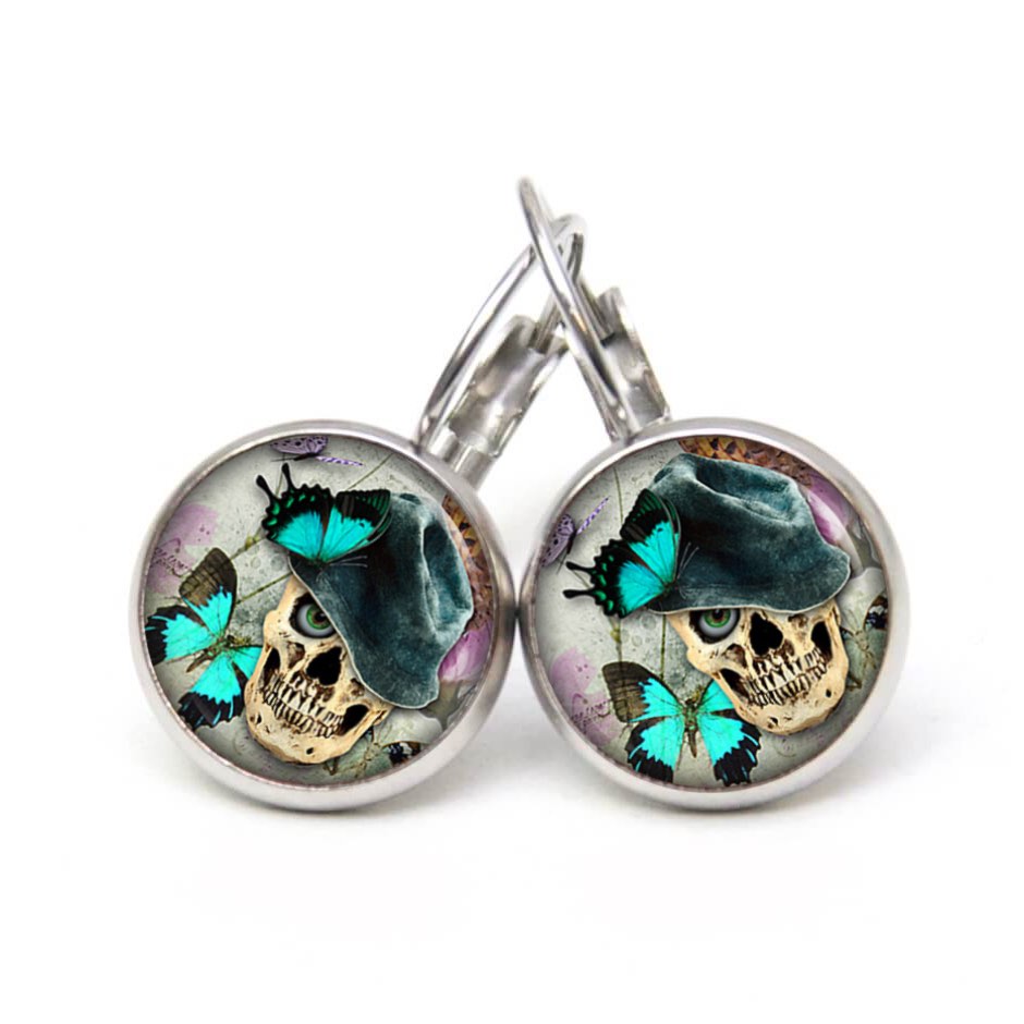 Ohrstecker, Ohrhänger, Clipse & Druckknopf – Motiv Totenkopf mit Schmetterlingen – Schmuck aus Edelstahl Ohrstecker, Ohrhänger, Clipse & Druckknopf – Motiv Totenkopf mit Schmetterlingen – Schmuck aus Edelstahl
