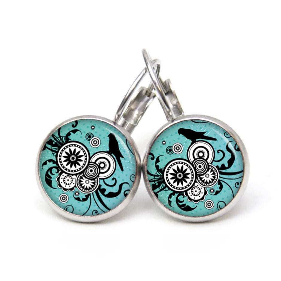 Ohrstecker Ohrhänger Clipse Druckknopf schwarz weißes Ornament mit einem Vogel Ohrstecker Ohrhänger Clipse Druckknopf schwarz weißes Ornament mit einem Vogel