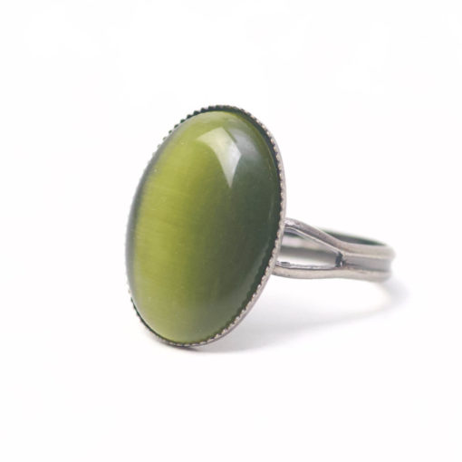 Schwarzer Cateye Ring Oval in olive grün