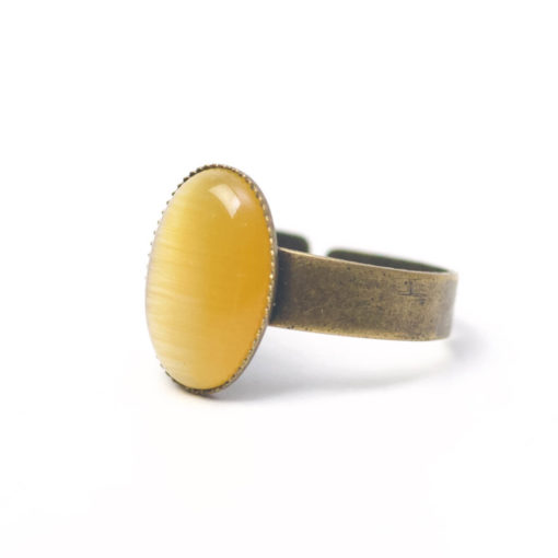 Bronzener Cateye Ring Oval in Sonnengelb