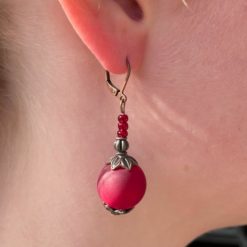 Vintage Ohrringe Kupfer mit großer dunkel roter Polaris Perle