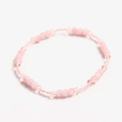 Zartes Perlenarmband mit rosa Cateye Perlen - Gummiband