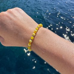 Perlenarmband mit gelben Polaris Perlen