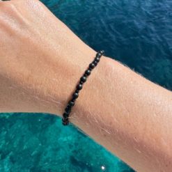 Zartes Perlenarmband mit schwarz Achat Perlen - stabilem Gummiband