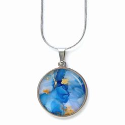 Handgemachtes Kette aus Edelstahl mit blau-goldenem Marmormuster als Kette und Ohrringe von Just Trisha