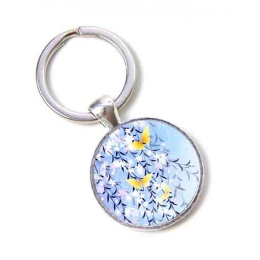 Schlüsselanhänger blaue Blumen mit Zitronenfalter